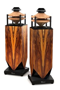 two wooden vases sitting on top of each other in front of a white background