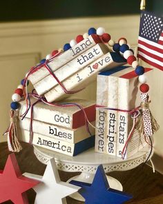 a cake made to look like books with american flags on top