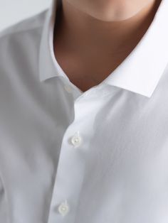 This dapper white dress shirt is tailored from 100% cotton making it comfortable and formal. With clear buttons and a cutaway collar this shirt can be worn with any blazer, cardigan or even on its own its a show stopper. This shirt is a whiter white compared to previous seasons. There is no stretch to this shirt please consider sizing up to the wide for a more relaxed fit. Wide sizes are 2 inches wider on the chest and waist compared to the regular sizes. See sizing chart for reference. Model we Cutaway Collar, White Shirt Dress, White Shirt, Long Sleeve Shirts, White Dress, Sleeve Length, Relaxed Fit, Blazer, Long Sleeve