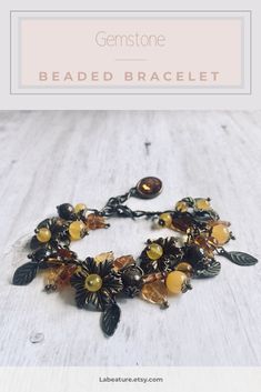 Gorgeous orange and yellow flower and leaf charm bracelet made of yellow jade gemstone beads, bronzite gemstone beads, Czech glass leaf beads, brass flower and leaf charms, lobster claw closure and finished with Swarovski crystal charm. This boho style accent bracelet is a great addiction to any outfit and will definitely make a statement. #handmadejewelry #gemstonebracelets #charmbracelet #bohojewelry #yellowjewelry Brown Czech Glass Jewelry Bracelet, Bohemian Amber Czech Glass Jewelry, Vintage Gemstone Beads Bracelet, Bohemian Amber Jewelry With Czech Glass, Nickel-free Amber Czech Glass Jewelry, Amber Colored Nickel Free Czech Glass Jewelry, Amber Czech Glass Nickel-free Jewelry, Amber Nickel-free Czech Glass Jewelry, Handmade Citrine Round Beads Jewelry