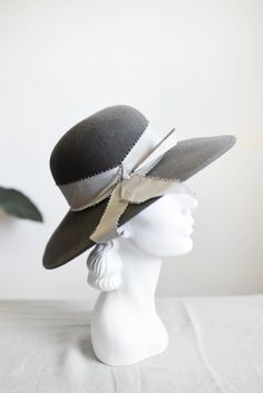 Description and Measurements: Fabulous grey felt wide brim hat with a wide grosgrain ribbon band and epic hat pin. A little snug on 22" but it does fit. Best for 21-22" heads.  Tag: Chapeau Creations Material: Grey Velour Condition: Excellent Follow along on instagram @lovecharlesvintage Grand Rapids Mi, Hat Pin, Wide Brimmed Hats, Hat Pins, Brim Hat, Wide Brimmed, Grosgrain Ribbon, Halloween Shopping, Caps Hats