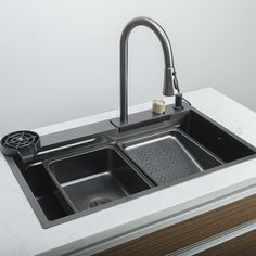 the sink is clean and ready to be used in the kitchen or barbeque