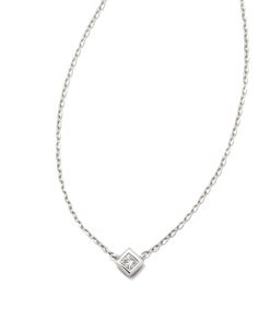 Our Michelle 14k White Gold Pendant Necklace in White Diamond features a princess cut White Diamond and an elegant metal frame. With its simple chain and stunning sparkle, this necklace is one you’ll want to wear forever and ever.r r We have taken steps to ensure that, when applicable, our diamonds are conflict free by requiring our suppliers to comply with the Kimberley Process.,Metal14k White Gold Rhodium PlatedMaterialWhite DiamondClosureSpring Ring ClaspSize16 With 2 Extender, 0.17Lx 0.17WCa Silver Jewelry With Single Diamond In Square Pendant, Silver Jewelry With Single Diamond Square Pendant, Silver Princess Cut Single Diamond Jewelry, Refined White Gold Princess Cut Jewelry, Sterling Silver Jewelry With Princess Cut Single Diamonds, Sterling Silver Princess Cut Single Diamond Jewelry, Princess Cut Single Diamond Sterling Silver Jewelry, Elegant Square Pendant Jewelry With Bezel Setting, Elegant Silver Princess Cut Necklace