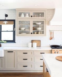 a kitchen filled with lots of white counter top space