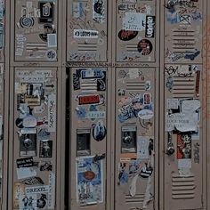 several metal lockers covered in stickers and decals