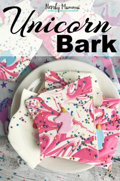 unicorn bark cookies on a plate with sprinkles