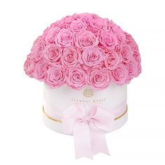 a white box with pink roses in it