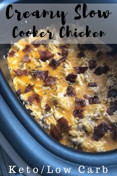 a crock pot filled with food and the words creamy slow cooker chicken in it