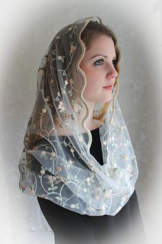 Includes sewn-in clip! Lovely, soft ivory scalloped lace infinity veil features fine embroidery, and flowers scattered throughout the lace detailing. On a sturdy English net. Choose either soft ivory or black at checkout. Dedicated to St Therese, the Little Flower. Also available in a wrap style here: https://www.etsy.com/listing/589635461/evintage-veils-st-therese-little-flower?ref=listing-shop-header-0 Evintage veils are handmade in limited production; not mass produced (so when they're gone, Veil Mantilla, Catholic Veil, Lace Mantilla, Mantilla Veil, Latin Mass, Chapel Veil, Photographie Portrait Inspiration, St Therese, Flower Soft