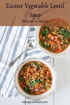 two bowls filled with vegetable lentil soup on top of a blue and white towel