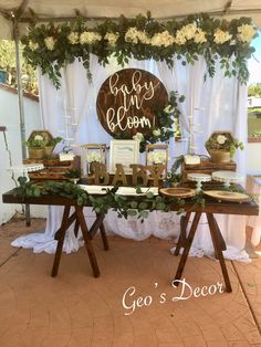 a table set up for an outdoor wedding reception