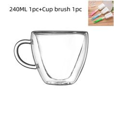 a glass cup with toothbrushes in it and the words 1800ml i - cup brush