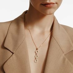 Make an infinite statement with our HEX Collection Pavé Hex Infinity Pendant. With 1.07ct of sparkling pavé, the perfectly shaped hexagons are connected by round bezel set diamonds in an articulated design. The repeated shapes and serpentine movement are representative of the most iconic design elements of MICHAEL M. SKU #P506 50mm x 12mm drop pendant 2pcs 2.5mm 36pcs 1.8mm 5pcs 1.2mm 1.07ctw 1.3mm forzatina chain adjustable 16-18" 14k yellow or white gold Diamonds G-H VS1-SI1 Gold Hex, Infinity Pendant, Bezel Set Diamond, Iconic Design, Womens Wedding Bands, Three Stone Rings, Cuff Earrings, Drop Pendant, G H