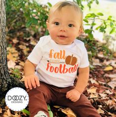 "Football baby bodysuit or infant and toddler t-shirt with a cute pumpkin graphic and \"Fall Means Football\" printed across the front. The orange & brown shades are perfect for your little athlete to wear this football season this fall. This would also make a great unisex baby shower gift that can be worn by baby boy or baby girl. ♥ ABOUT DOOZY DESIGNS ♥ Here at Doozy Designs we take great pride in what we create and want to offer you unique high quality handmade items at affordable prices. Baby Boy Football, Baby Boy Baseball, Baby Boy Camo, Football Onesie, Football Outfit, Sports Baby Shower, Custom Baby Onesies, Fall Baby Clothes, Unisex Baby Shower