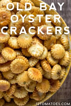 old bay oyster crackers on a plate with the words, old bay oyster crackers