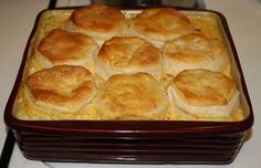 a casserole dish is sitting on the stove top, ready to be eaten