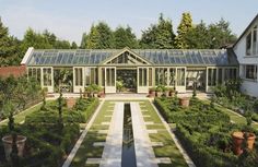 an image of a garden setting in the middle of it's own yard with lots of greenery