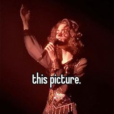 a woman singing into a microphone with the words, this picture