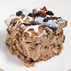 a close up of a plate of food with raisins and blueberries on it