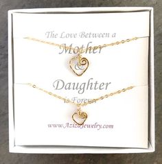 This Gold Hearts Necklace Set is just for your favorite mother-daughter duo. These matching 14k gold filled heart necklaces make the bond between mother and daughter even more special. "The love between a mother and daughter is forever."DETAILS:Two swirly heart necklaces are hand formed from 14k gold filled wire into the shape of hearts and then hammered for texture and shine. The larger heart measures about 1/2 inch wide while the smaller heart measures a little more than 1/4 inch wide. Each se Double Heart Jewelry For Birthday And Mother's Day, Open Heart Necklace For Birthday And Mother's Day, Open Heart Necklace For Mother's Day And Birthday, Double Heart Jewelry For Birthday Gift And Mother's Day, Double Heart Charm Necklace For Mom, Valentine's Day Double Heart Charm Necklace For Mom, Double Heart Necklace For Mother's Day Birthday, Mother's Day Double Heart Necklace With Heart Beads, Mother's Day Jewelry With Heart Charm For Birthday Gift