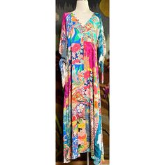 New With Tags Size Small This Gorgeous Maxi Dress By Johnny Was Has A Breezy Bohemian Look. The Long Dress Has A Floral & Mosaic Patchwork Pattern. It Has Three Quarter Sleeves That Have Romantic Ties. This Dress Has A Flattering V-Neck With Buttons Down The Bodice. It Has A Tiered Loose Dropwaist. The Beautiful Dress Is Unlined & Does Not Come With A Slip. It Has Pockets! Measurements Laying Flat: Length 56 1/4” Bust 18 1/4” Waist 18.5” Hips 20” Mosaic Patchwork, Gorgeous Maxi Dresses, Floral Mosaic, Tie Maxi Dress, Shirred Dress, Tie Front Cardigan, Tie Dye Maxi, Bohemian Look, Patchwork Patterns