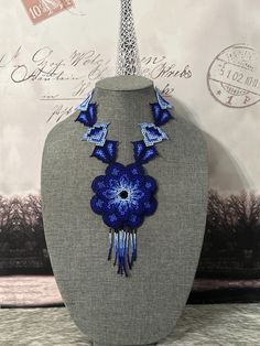 Beautiful large 3D flower necklaces, handmade with beads by Mexican artisans Blue Flower-shaped Bohemian Necklace, Blue Bohemian Flower Necklace, Bohemian Blue Jewelry With Handmade Flowers, Blue Bohemian Flower Beaded Necklaces, Bohemian Blue Flower Necklace, Handmade Blue Flower Beaded Necklaces, Blue Flower-shaped Beads For Gifts, Handmade Blue Flower Beaded Necklace, Blue Flower Beads For Gifts