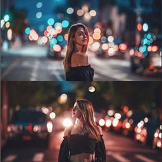 a woman standing in the middle of a street at night with traffic lights behind her