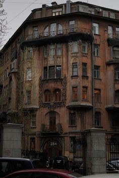 an old building with many windows and balconies