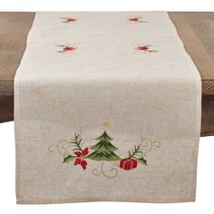 a table runner with christmas decorations on it