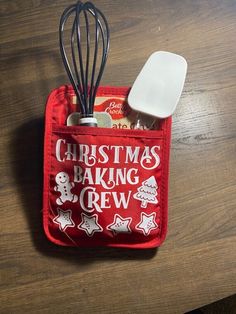 a kitchen utensil holder with christmas baking crew design on the front and bottom