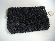 arteyes store Heres a beautiful guaranteed vintage beaded purse made by Richere (Hong Kong).Condition of the beaded purse is very good, no damage.The purse has a corral like beaded design very unique. Purse measures 6-1/2" long by 4" tall. Nice vintage clutch.I pack very careful and ship small flat rate box to save you money! Beaded Rectangular Coin Purse For Party, Sequin Pouch Clutch For Evening, Sequined Evening Clutch Pouch, Evening Sequined Pouch Clutch, Handmade Clutch Pouch For Evening, Beaded Clutch Pouch For Evening, Vintage Clutch, Small Clutch, Small Flat