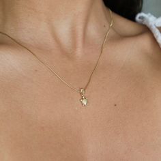 "14k Gold Turtle Necklace Charm, Sea Turtle Jewelry, 14K Gold Turtle Necklace, Yellow Gold Sea Turtle Necklace Charm, Dainty Turtle Necklace, Can be worn with other necklaces, great for layers. A Perfect 14K Gold gift. . . . * Pendants Measurements With Bail: ((17 x 8 mm) * Chain is included ( 1MM Box Chain) * Stamp: Real 14k Gold * Never gold filled or plated * Packaged With Free Gift Box . . . If you have any questions, just hit the \"Message the Seller\" button ( bottom right of the page) and Gold Turtle Necklace, Fine Jewelry 14k Stamped Pendant Charm Necklace, Fine Jewelry 14k Stamped Charm Necklace, Stamped 14k Fine Jewelry Charm Necklace, Gold Diamond Cut Charm Necklace Fine Jewelry, Sea Turtle Jewelry, Cool Ear Piercings, Sea Turtle Necklace, Ocean Necklace