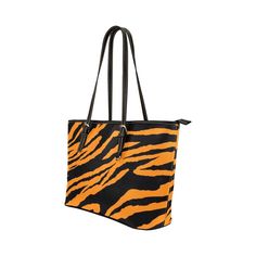 The favorite everyday bag, with the trend print of the year!  This shopper bag designed with tiger print will make you look unique, radiant and fabulous.  Dare to give a wild touch to your look.  Interior: One main compartment, large enough to carry your wallet, laptop, cosmetic case, agenda, sunglasses, etc.  1 large zippered pocket and 2 small open pockets.  The handle is comfortable, sturdy and adjustable, perfect for shoulder carrying.  Made of high quality PU leather.  Measurements: length 37 cm x width 14 cm x height 28 cm  The print is a unique creation of TASDA. Leather Bags With Animal Design For Everyday Use, Casual Black Bag With Animal Design, Black Animal Design Satchel Bag, Black Bag With Animal Design For Everyday Use, Black Bags With Animal Design For Everyday Use, Black Shoulder Bag With Animal Design For Daily Use, Casual Shoulder Bag With Animal Design, Leather Shoulder Bag With Animal Design, Black Animal Design Bag For Everyday Use