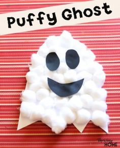 a paper plate with marshmallows in the shape of a ghost