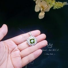 "Large Beautiful ASSCHER DADIANT cut green peridot. You can clearly see the ripple shining from the center. not Cushion or pillow cut. Gorgeous Unique Artisan design Full Sterling Silver Made Luxury Gemstone Jewelry ◆◆Pendant Main stone: 10mm created Green Perdot Pendant Height ( include bail) : 30 mm Pendant Holder (bezel & Bail) : Solid 925 Sterling Silver Accent Stone: Sim Diamond ◆◆ Necklace chain : Platinum gold coated 925 sterling silver Box Chain with length option from 16\" ~20\". Th Peridot Pendant, Peridot Necklace, August Birthstone, Luxury Diamonds, Asscher Cut, Silver Box, Green Peridot, Artisan Design, August Birth Stone