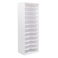 a white bookcase with six shelves on each side