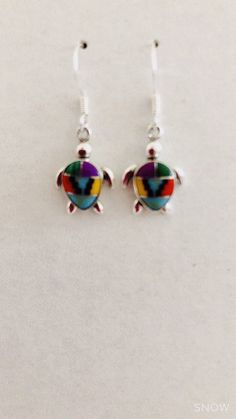 * Handmade item *925 Sterling silver * Gemstone: Multi color inlay * Sea Turtle inlay * Stone 7x9 Teadrop *Dangle drop Earrings *Free gift box *Free shipping in USA *Ready to ship *Thank you for looking and check out more items in my Etsy shop for more great items and deals! *Https://www.etsy.come/shop/abq925 Dangle Inlay Earrings For Gifts, Dangle Earrings With Inlay For Gift, Multicolor Sterling Silver Earrings For Gift, Inlay Dangle Earrings For Gift, Drop Earrings With Inlay As Gift, Inlay Drop Earrings Jewelry Gift, Sterling Silver Drop Earrings With Inlay, Gift Dangle Earrings With Inlay, Sterling Silver Inlay Drop Earrings