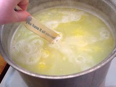 a person is holding a wooden spoon in a pot of boiling water with the words you have it all gone