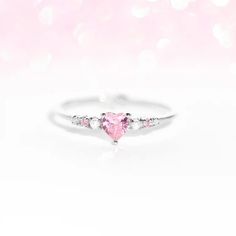 Indulge in romance with our Heart is Full Ring that's all about love without the cheesiness! This dazzling ring features a heart-shaped gem that sparkles brighter than a shooting star, making it the perfect accessory to dial up your charm. Wear your heart on your finger and let this ring be your stylish declaration of Promise Ring Heart, Star Making, Cute Promise Rings, Heart Wedding Rings, Heart Is Full, Heart Rings, All About Love, Jewelry Lookbook, Shooting Star