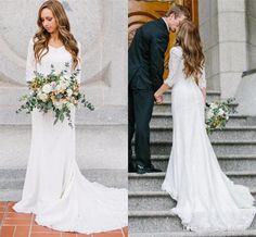 the bride and groom are standing on the steps