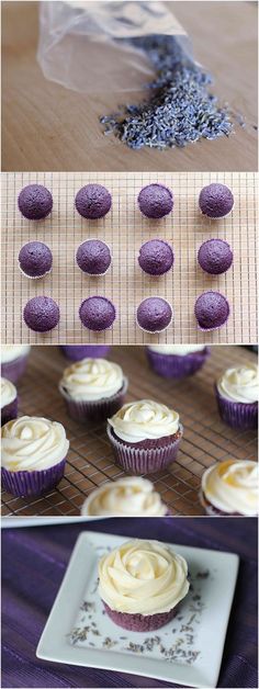 purple cupcakes with white frosting sitting on top of a table next to a plate