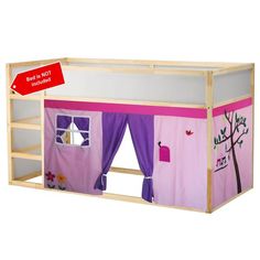 a child's bed with a pink tent and purple curtains on the bottom floor