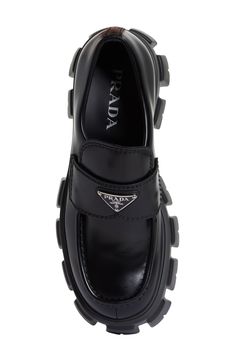 A '90s-inspired, superchunky lugged sole dramatically lifts this loafer crafted from polished Italian leather and branded with Prada's enameled triangle logo. Leather upper and lining/rubber sole Made in the UK Men's Designer Shoes Prada Shoes Men, Designer Shoes For Men, Prada Loafers Men, Designer Shoes Men, Prada Loafers, Mens Designer Shoes, Best Shoes For Men, Best Running Shoes, Prada Men