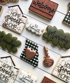 decorated cookies are displayed on the table for someone's special occasion to share with her