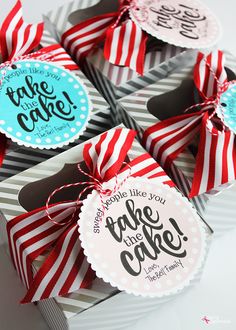 several boxes with different designs on them that say take the cake