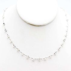 For Sale on 1stDibs - 27 astonishingly beautiful faceted diamond beads (approximately 38 carats) decorated on a platinum chain. A classical timeless diamond necklace that is Silver Bridal Necklace With Single Cut Diamonds In Platinum, Silver Platinum Bridal Necklace With Single Cut Diamonds, Classic Silver Briolette Diamond Necklace, Classic Silver Diamond Necklace With Briolette Cut, Silver Platinum Bridal Necklace With Diamond Cut, Single Strand Diamond Bead Jewelry, Silver Briolette Diamond Necklace Fine Jewelry, Dazzling Silver Single Strand Jewelry, Silver Briolette Diamond Necklace In Fine Jewelry Style