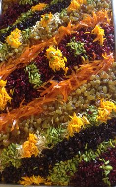 an assortment of dried fruits and vegetables on a tray