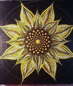 a yellow and black sunflower is shown in the middle of a circle with dots on it