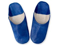 Comfortable and Soft Men's Blue Leather slip-on Babouche Slippers. These super comfy leather slippers are natural, breathable, will mould themselves to the shape of your feet and are perfect for relaxing in the mornings and evenings after a hard days work. The ideal gift, and of course, the ultimate work from home footware! Our babouches are made using soft supple organic sheeps leather which has been processed naturally without the use of nasty chemicals such as chromium. The leather is hand dyed in our bespoke range of colours and our babouche maker then cuts the leather and handmakes the babouche with a skill that is passed down from generation to generation, keeping the traditional artisanal craft alive. As these babouche are handmade they may have some imperfections making them imperf Blue Leather Mules With Leather Sole, Blue Leather Slippers With Round Toe, Blue Leather Closed Toe Slippers, Babouche Slippers, Sheepskin Slippers, Moroccan Leather, Hard Days, Leather Slippers, Day Work