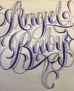 an image of the word angel's baby written in cursive writing on a piece of paper